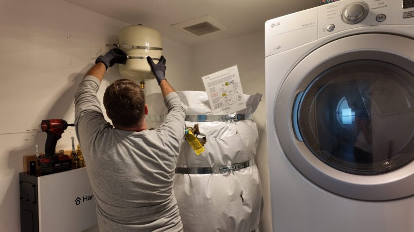 A plumber fixing plumbing emergencies